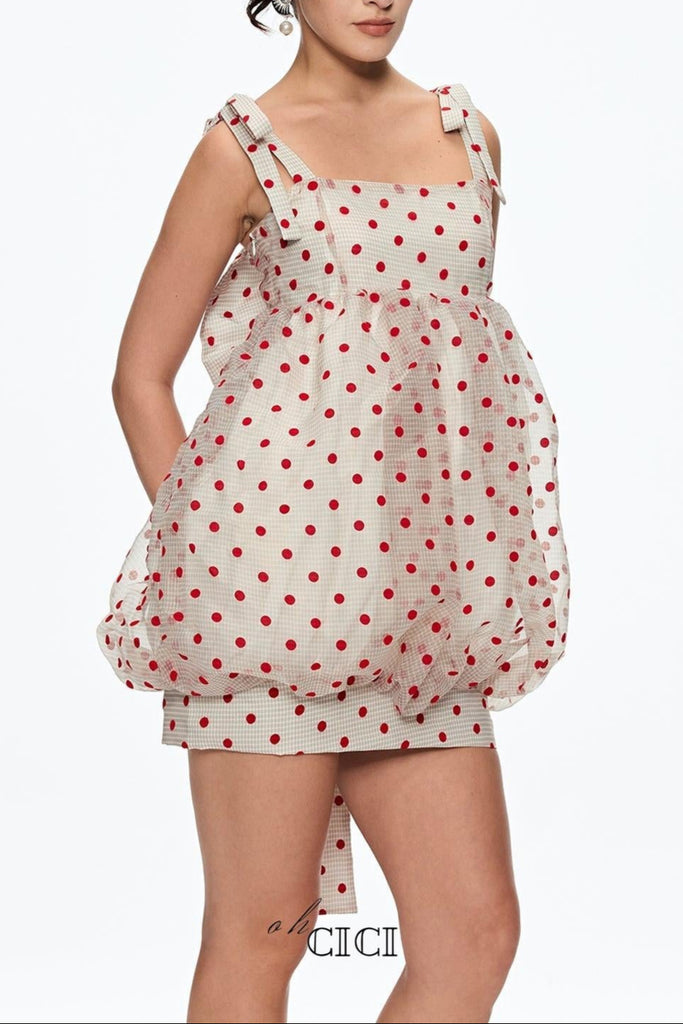 Woman polka dot dress in white